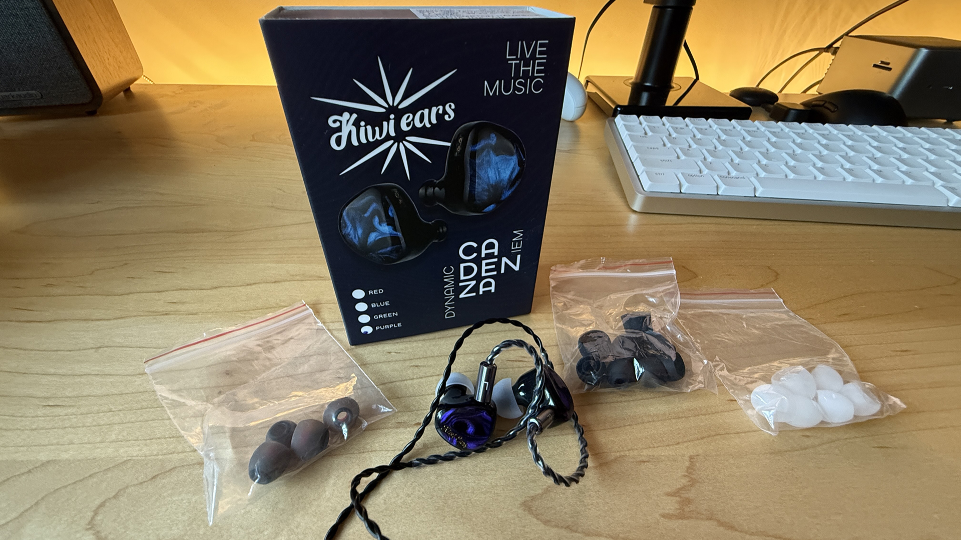 The purple Kiwi Ears Cadanza earphones.