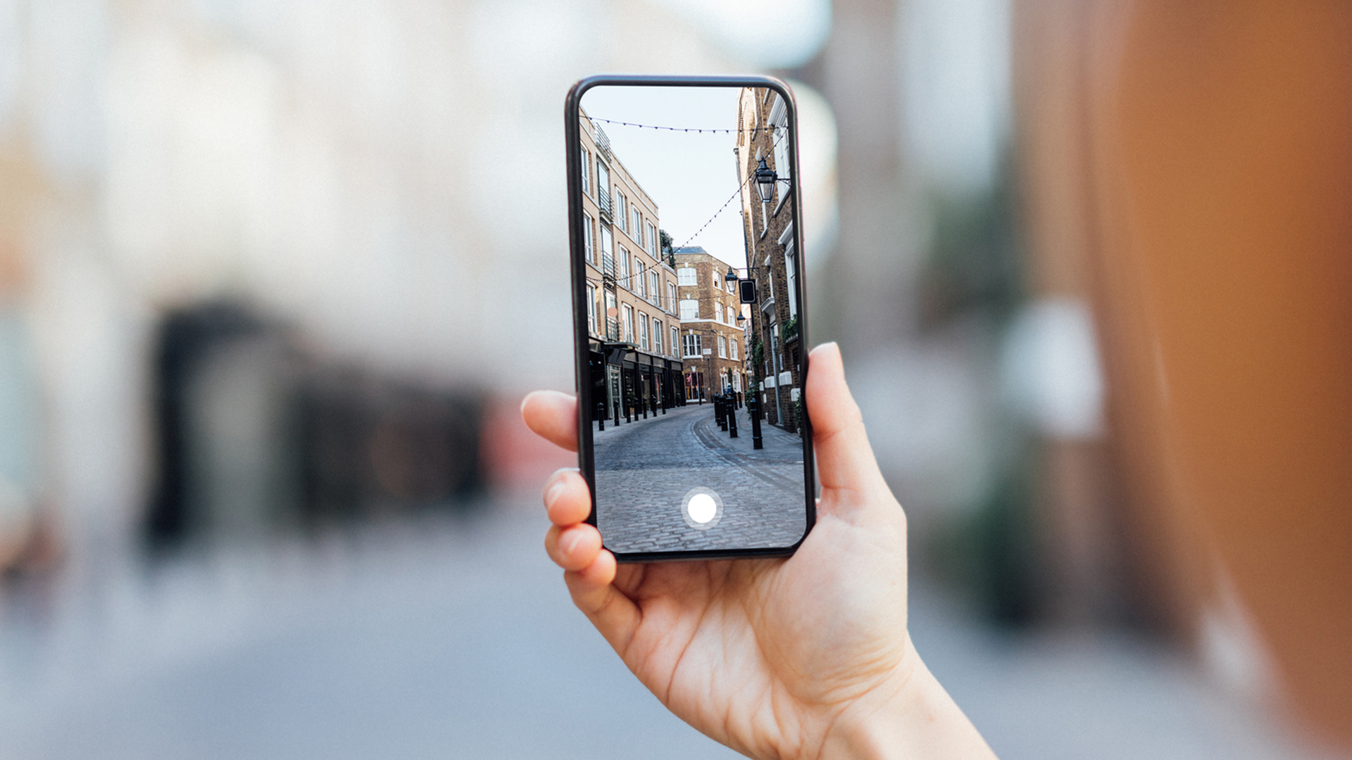 Someone holding an iPhone.