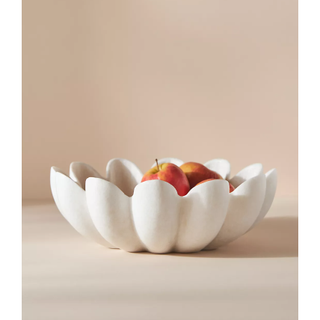 marble fruit bowl in the shape of an upturned flower