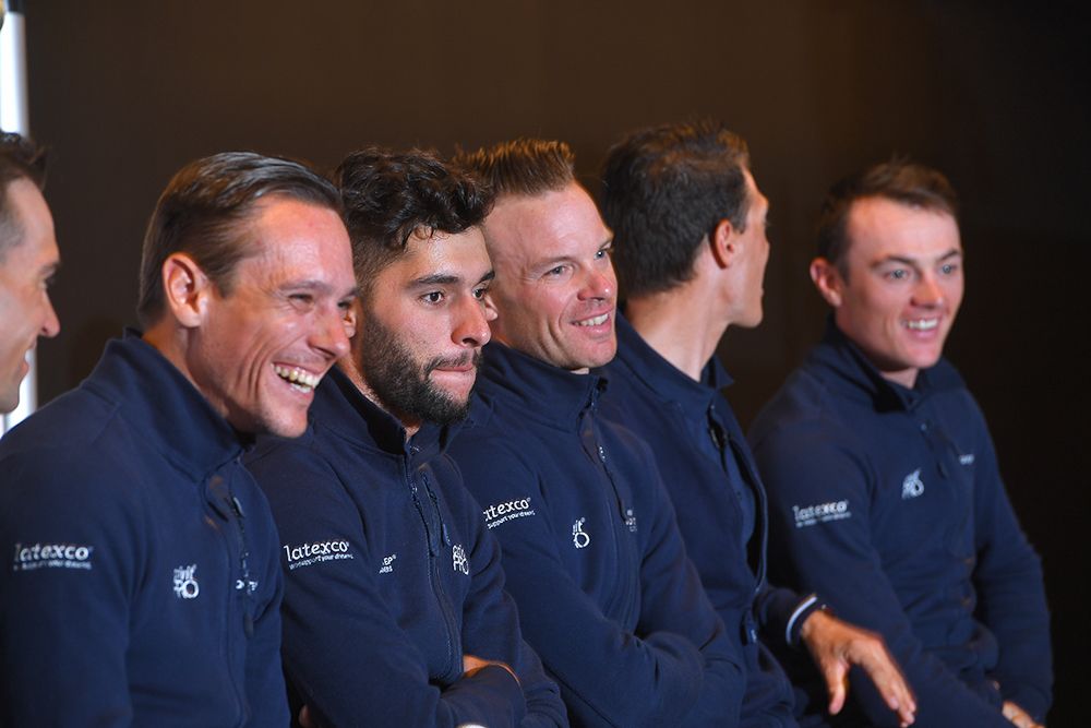 Quick-Step riders share a laugh during the press conference ahead of Omloop Het Nieuwsblad