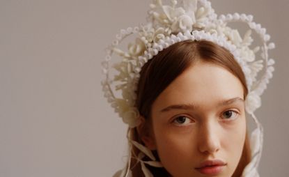 Model wears headdress, part of Ukrainian Creators Fair 2023, New York