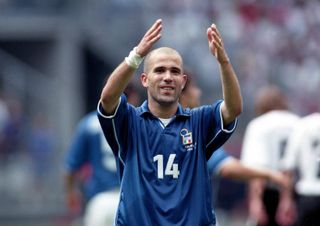 Luigi Di Biagio greets the Italy fans at the 1998 World Cup.