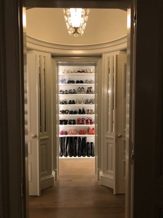 color organized closet with shoe racks by Jessica Lagrange