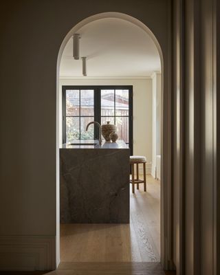 Marble countertops with a vase and chair