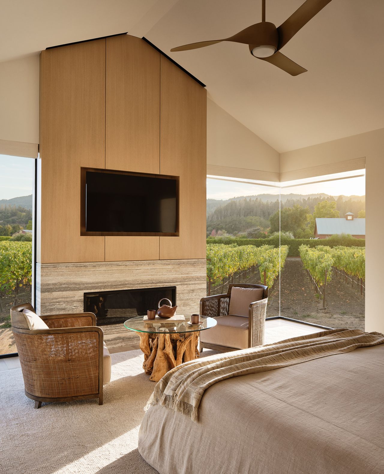 a bedroom with a freplace and wall mounted tv