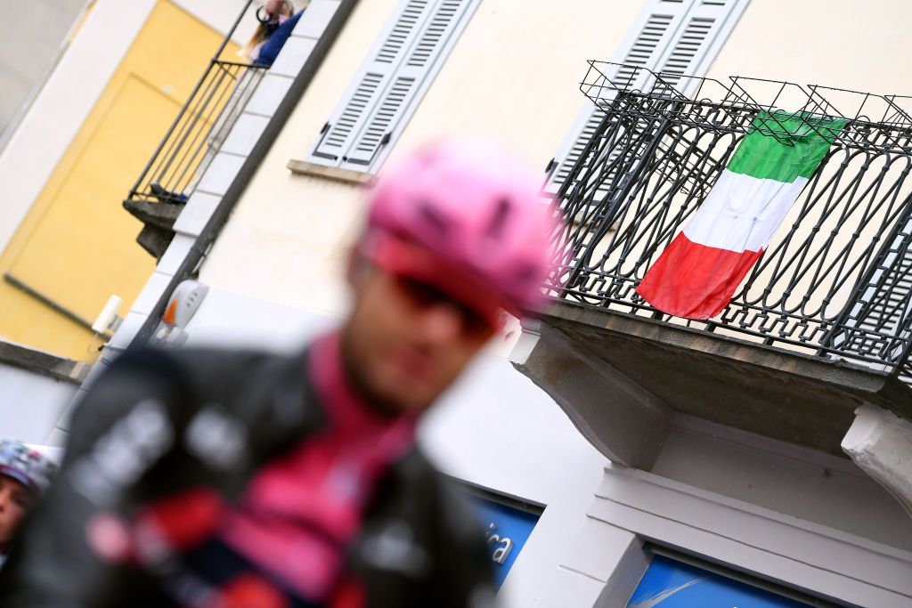 CANALE ITALY MAY 10 Filippo Ganna of Italy and Team INEOS Grenadiers Pink Leader Jersey Italian Flag at start during the 104th Giro dItalia 2021 Stage 3 a 190km stage from Biella to Canale Rain girodiitalia Giro on May 10 2021 in Canale Italy Photo by Tim de WaeleGetty Images
