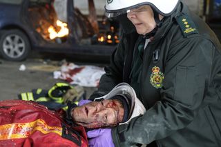 Ethan being treated by paramedic Jan Jenning at the site of the terrorist attach on Holby