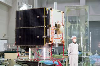 Japan unveils the Hayabusa2 asteroid probe on Dec. 26, 2012, during an event at JAXA's Sagamihara Campus. The spacecraft will launch in 2014 to collect samples of the asteroid 1999 JU3.