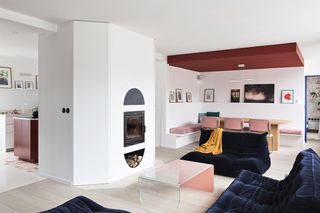 A white living room with color pops