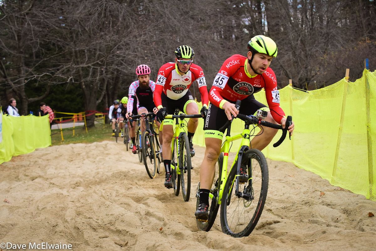 Cyclesmart Sat Women leading his team-mate Raphael Gagne through the long sand pit