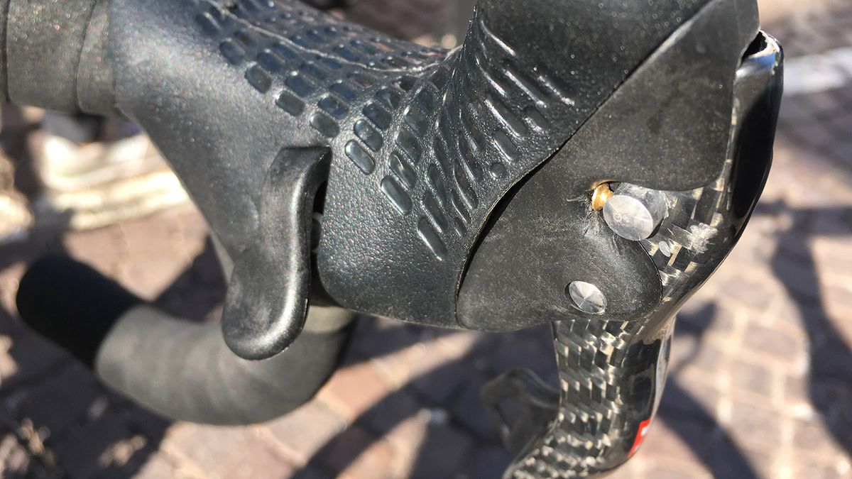 Aru adapts his brake levers with a small screw to reduce the reach of the lever