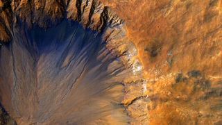 A Fresh Crater near Sirenum Fossae on Mars