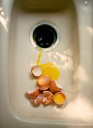 broken eggs in sink