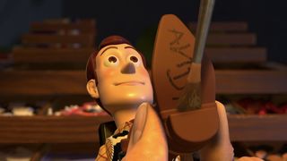 Andy's name is painted over Woody's boot