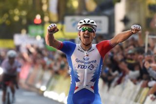 French rider of team Groupama FDJ Arnaud Demare C celebrates after crossing the finish line to win the 115th edition of the 2123 km ParisTours one day cycling race in Tours Central France on October 10 2021 Photo by GUILLAUME SOUVANT AFP Photo by GUILLAUME SOUVANTAFP via Getty Images