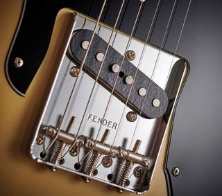 The bridge single coil has a 60s wind with a DCR of 7.41k and it's packing quite a bit of heat.