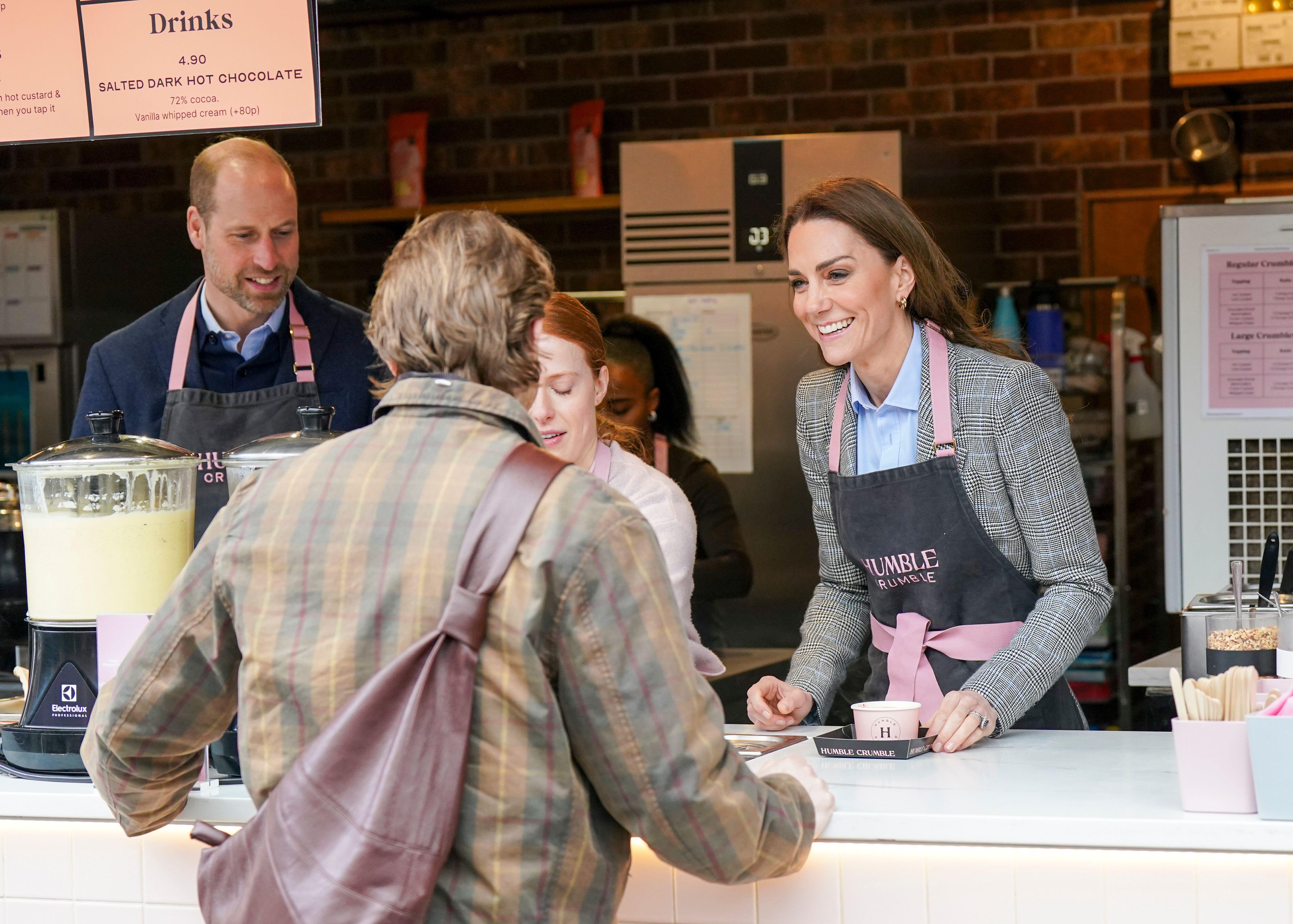 3E0FY21 The Prince and Princess of Wales at the Humble Crumble stall during a visit to Borough market in London. Picture date: Thursday March 12, 2026.