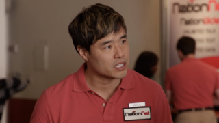 Randall Park looking shocked in New Girl