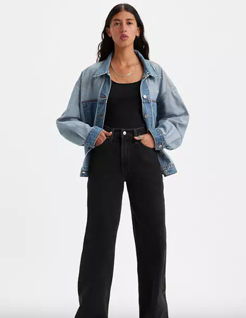 Woman in black jeans