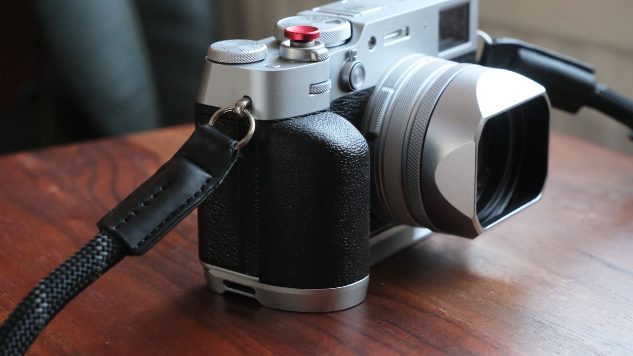 Fujifilm X100VI camera on a wooden table