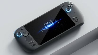 Ayaneo Next 2 handheld on grey block platform with logo on screen.