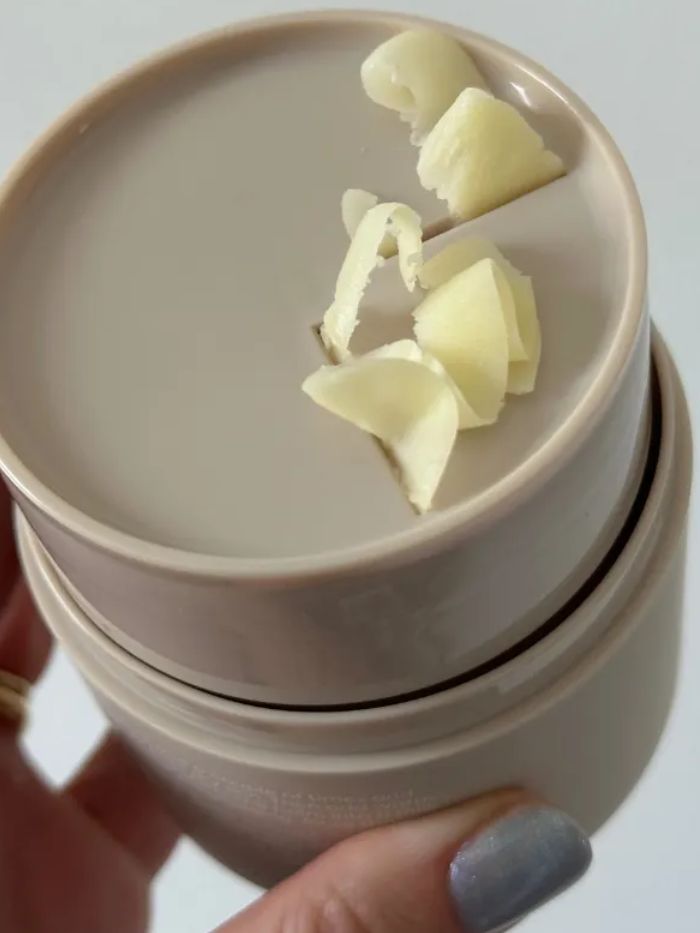 Grace Day holding the No7 Good Intent Glow Grind Cleansing Balm