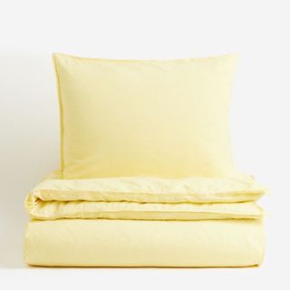 Light yellow duvet cover and pillow