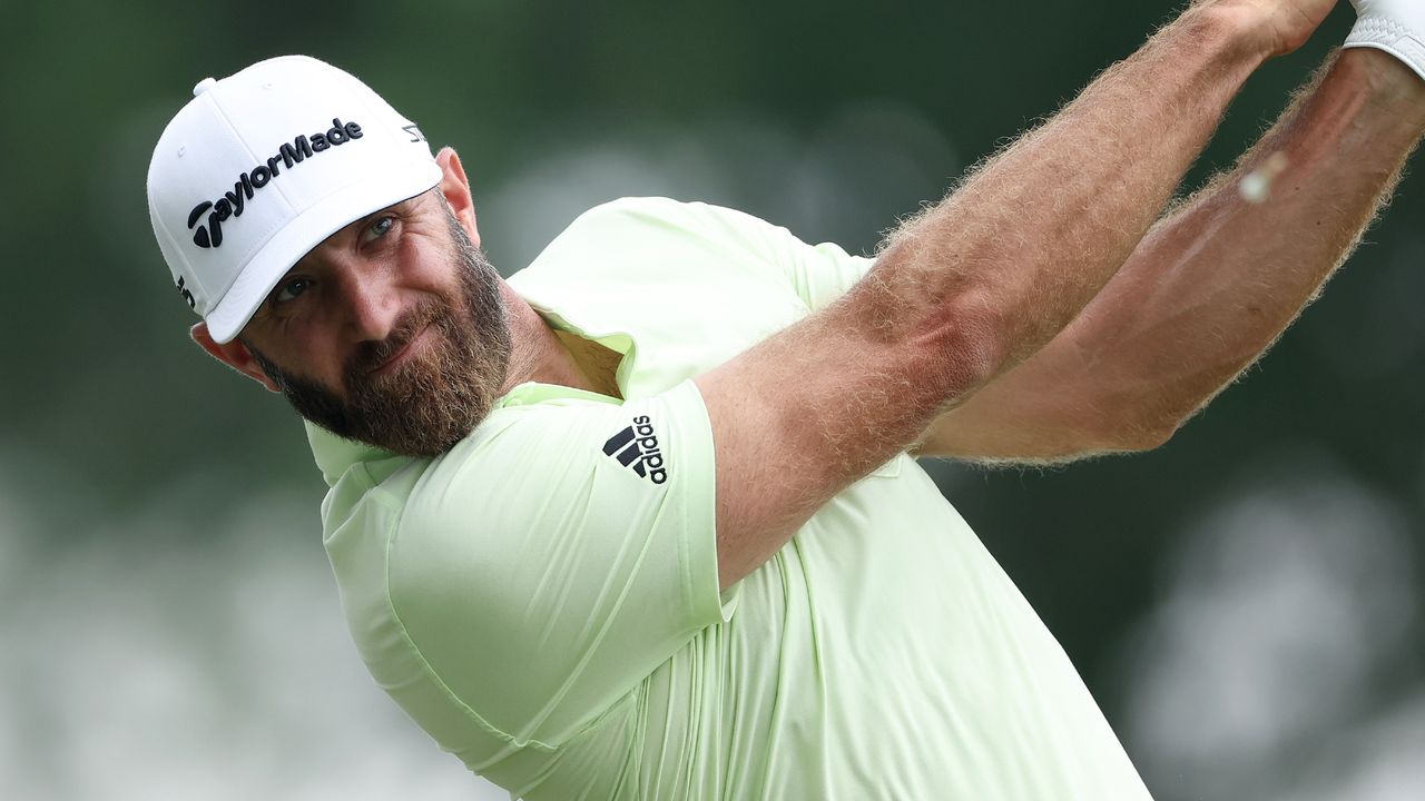 Dustin Johnson plays a tee shot during the 2022 PGA Championship