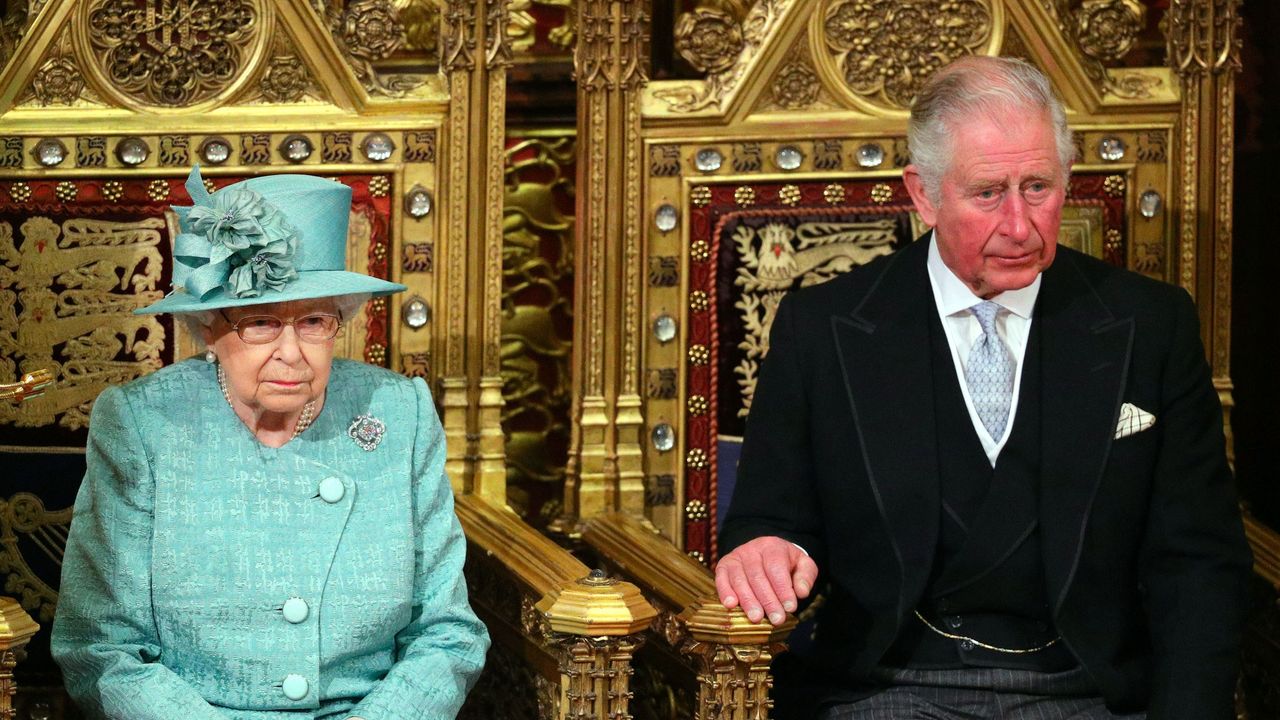 Queen Elizabeth&#039;s third coronation crown explained. Seen here the Queen sits alongside the Prince of Wales for the state opening of parliament