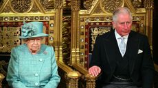 Queen Elizabeth's third coronation crown explained. Seen here the Queen sits alongside the Prince of Wales for the state opening of parliament