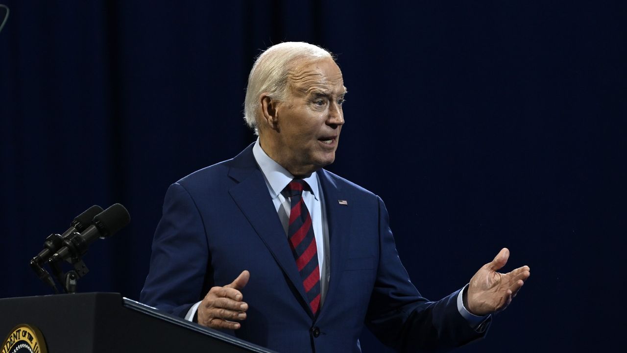 President Joe Biden talks and gesticulates