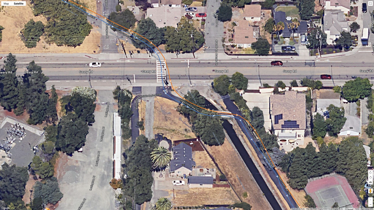 A Google Maps satellite image showing how the COROS PACE 4 (orange line) compares to the Garmin Forerunner 970 (blue line) for dual-frequency GPS accuracy for a suburban route.