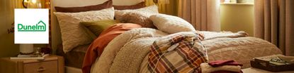 Dunelm logo top left with a close up shot of a cosy bed in beige hues