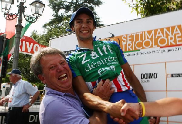 Stefano Agostini celebrates his national championship with his team director.