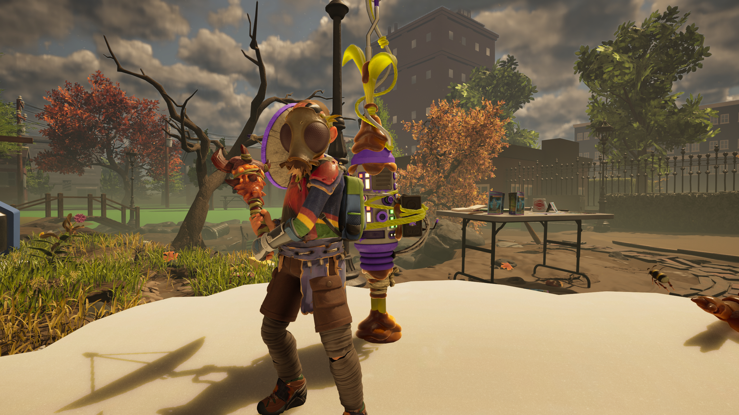Grounded 2 O.R.C. transmitters Signals and Stashes: A character holding a club and wearing a gas mask, standing atop the bin next to an O.R.C. transmitter.