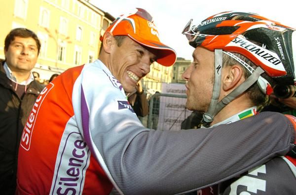 Lombardia winner Philippe Gilbert, left, celebrates his victory with Silence-Lotto teammate Matthew Lloyd.