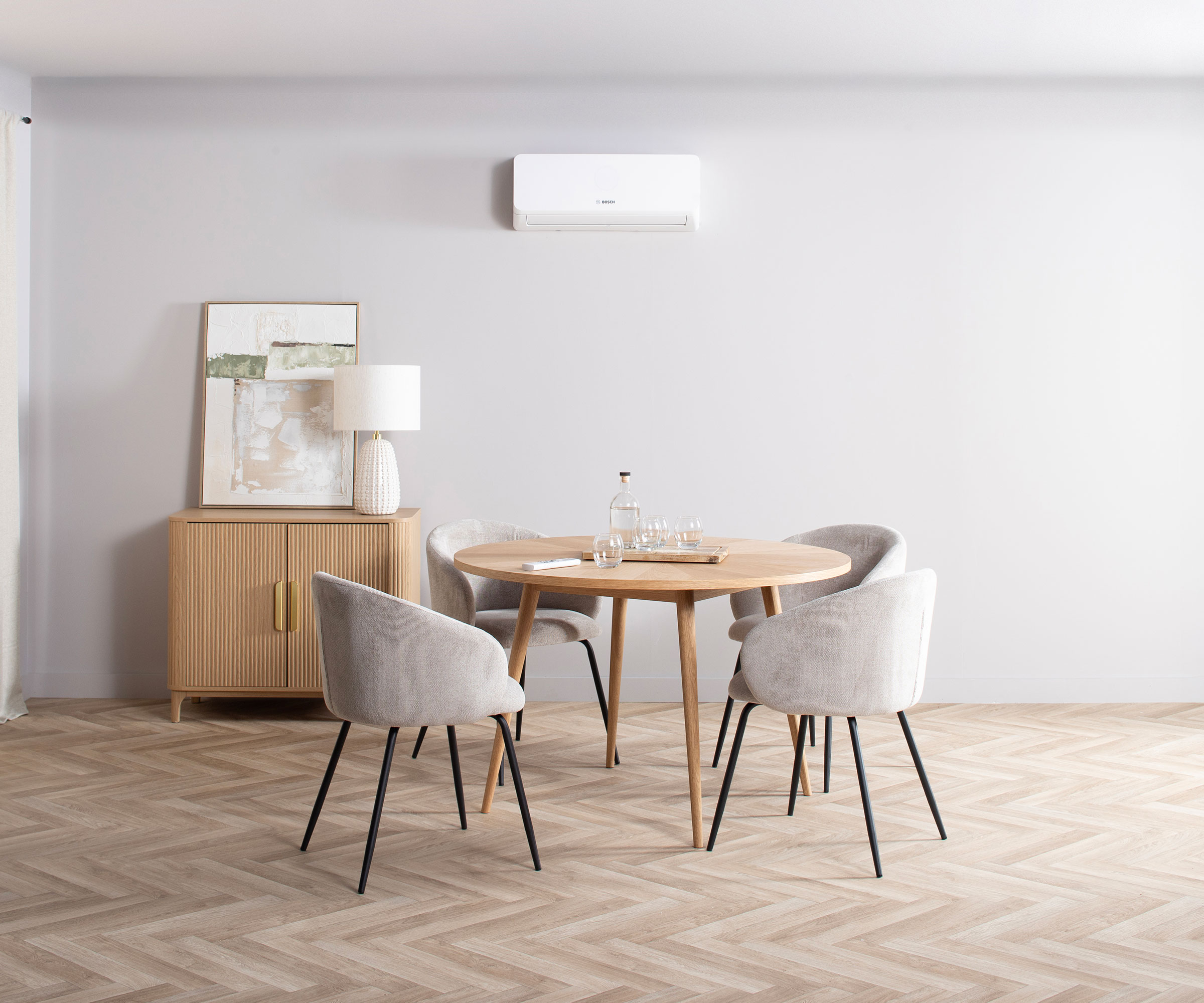 modern dining room with white wall-mounted air conditioning unit