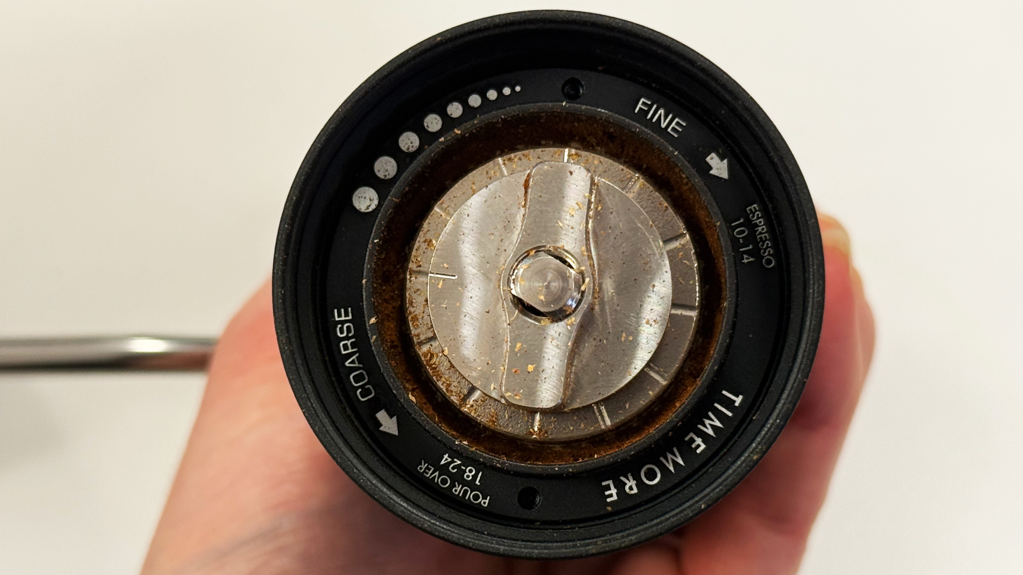 a photo of the timemore chestnut c2s grinder with coffee