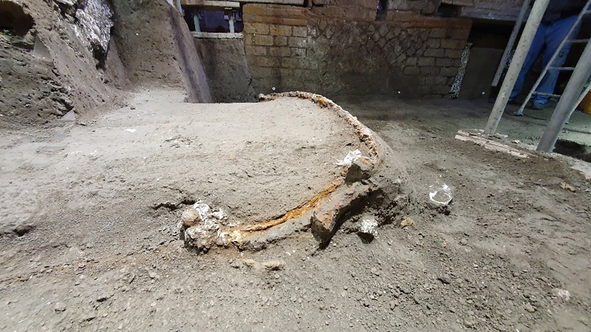 The ornate ceremonial chariot was initially hidden beneath the carbonized  beams of a wooden ceiling that collapsed in the eruption, along with the surrounding walls.