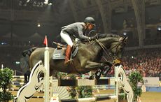 Meredith Michaels-Beerbaum and Checkmate 4 competing at Olympia in 2011.