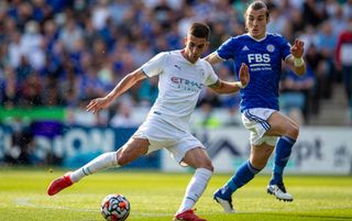 Manchester City forward Ferran Torres and Leicester City defender Caglar Soyuncu