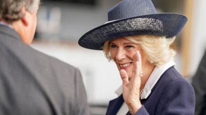 Camilla, Queen Consort arrives at Ascot Racecourse on October 15, 2022 in Ascot, England. 