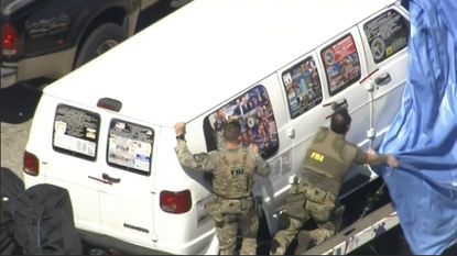 Van covered in Trump stickers.