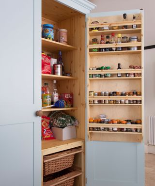 A painted pantry with door shelving