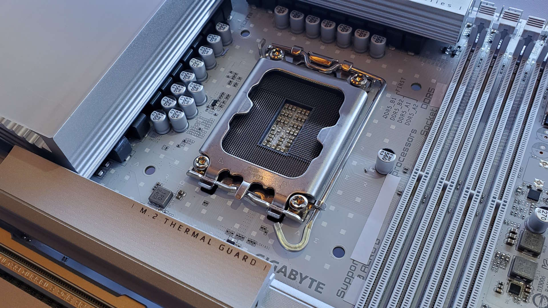 Gigabyte's 'Next-gen' Intel motherboard shows off the new Arrow Lake CPU socket for the first time alongside AMD's X870E