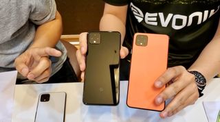 Pre-release Pixel 4 XL units side-by-side in Just Black and Oh So Orange.