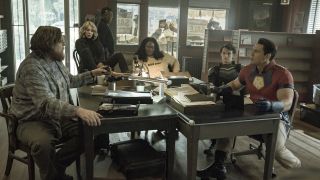 Peacemaker Season 1's main cast of protagonists meeting together at hideout