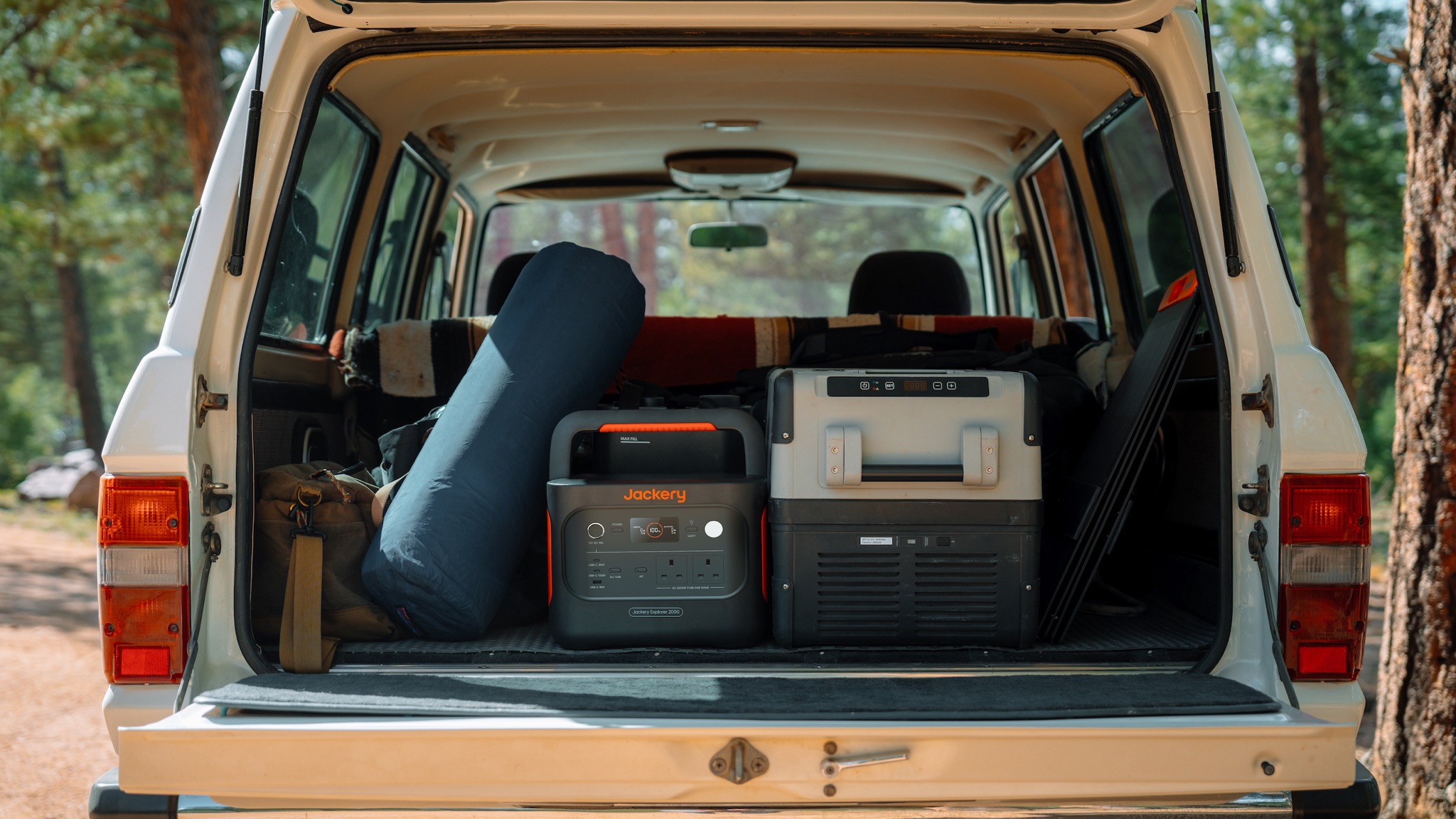 Jackery portable power station in the back of an estate car or SUV