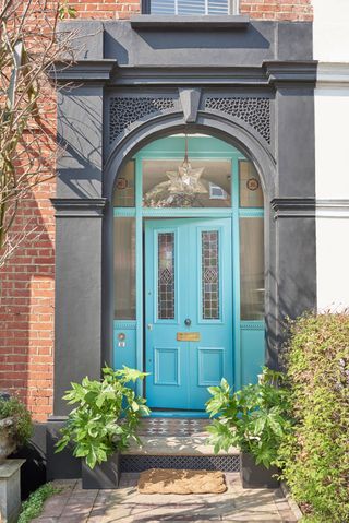 a blue front door by Dulux on a period property