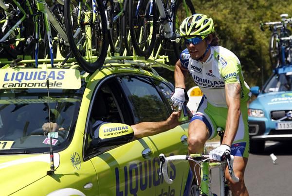 Daniel Oss (Liquigas - Cannondale) gets some support from his team car.